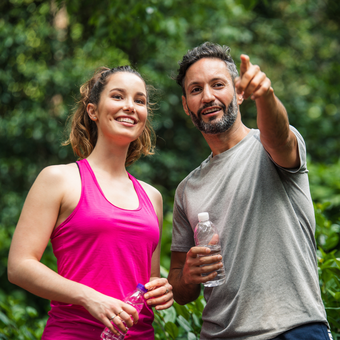 Couple working out outdoors